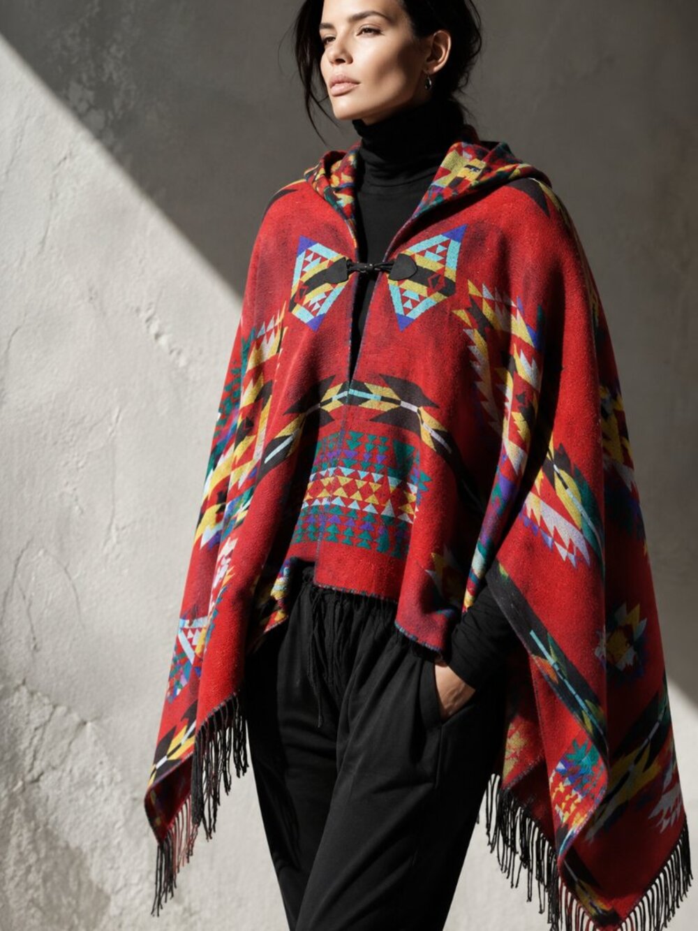 Hooded cape w. Southwestern inspired pattern